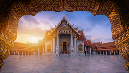 Wall Mural - The Marble Temple, Wat Benchamabopitr Dusitvanaram at sunrise in Bangkok, Thailand.