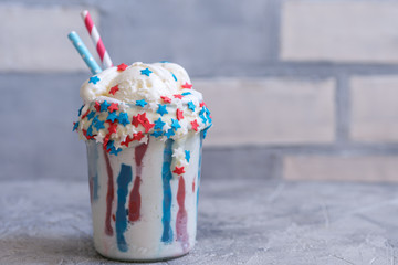 Wall Mural - Vanilla funfetti milkshake with ice cream. Patriotic drink cocktail