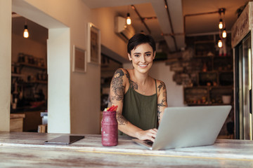 Woman working on laptop computer