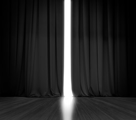 black curtain background with bright light behind