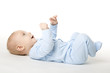 © inarik - Baby Lying on Back, Happy Infant Kid Dressed in Blue Bodysuit, Beautiful Child Lie on White background looking up