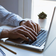 Man working on laptop computer