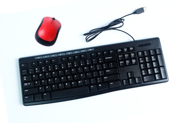 Wired keyboard and wireless mouse isolated on white background