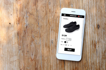 Wall Mural - Mobile ecommerce website with black sneakers page