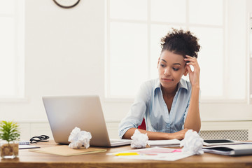 Thoughtful business woman at office