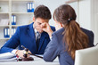 © Elnur - Lawyer talking to his client in office