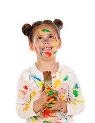 Canvas Print - Pensive girl with hands and face full of paint isolated on a white background