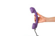 © LIGHTFIELD STUDIOS - cropped shot of woman holding purple telephone tube in hand isolated on white
