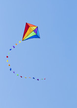 Colorful Kite On The Blue Sky