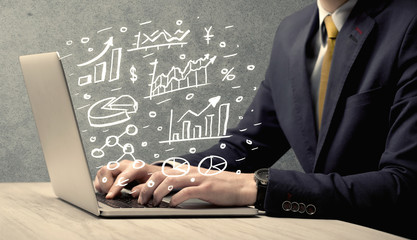 Wall Mural - Sales person in suit using a laptop to calculate pie chart and exponential growth statistics on office desk concept