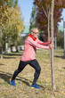 © 2Design - Senior man stretching after jogging in the park