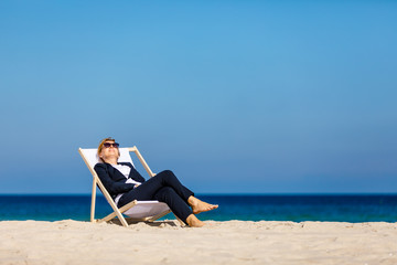 Woman relaxing on beach