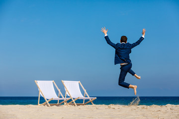 Wall Mural - Man relaxing on beach