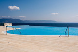 Fototapeta Most -  swimming pool overlooking the sea in Rabac, Istria region , Croatia 