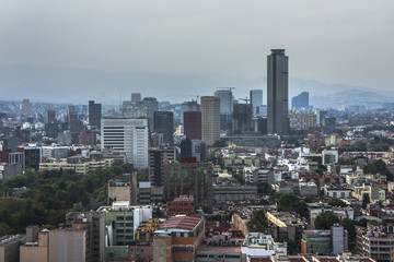 Fototapete - Skyline in Mexico City, Reforma aerial view at sunset time