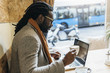© santypan - Businessman using his laptop in the Coffee Shop.