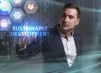 Business, Technology, Internet and network concept. Young businessman working on a virtual screen of the future and sees the inscription: Sustainable development