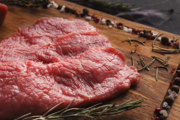 Canvas Print - Raw beef filet mignon steaks on wooden board