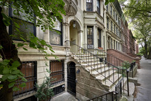 A Row Of Colorful Brownstone Buildings In A Historic Neighborhood Of Brooklyn In New York City