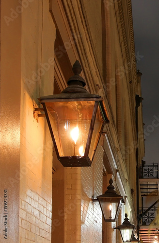 New Orleans French Quarter Gas Lights Night Street View With New Orleans French Quarter Gas Lights Night Street View With Glowing Real Lanterns On