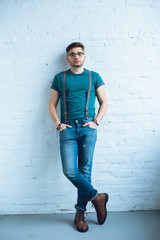 Fototapete - Bearded young man wearing t-shirt and jeans