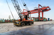 © onlyyouqj - The crane is hoisting containers at the wharf