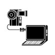 © djvstock - camera plugged into a laptop over white background, vector illustration