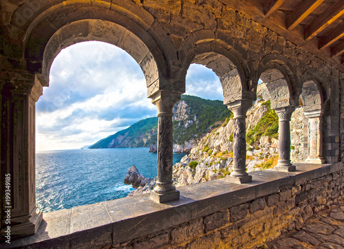 magical sea view through the castle and gothic Church of St. Peter arches in ...