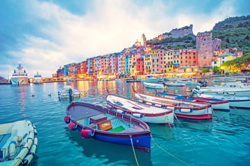 mystic landscape of the harbor with colorful houses and the boats in porto venero, italy, liguria in