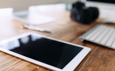 Picture of digital tablet on office desk