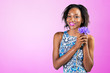 © fotofabrika - charming beautiful African woman holding flower