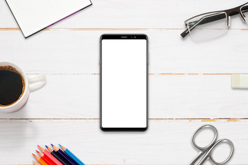 Poster - Hero header image on work desk with modern smart phone with isolated display for mockup, app, web site presentation. Flat lay, top view.