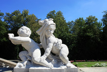 Statue Of Children Playing In Park
