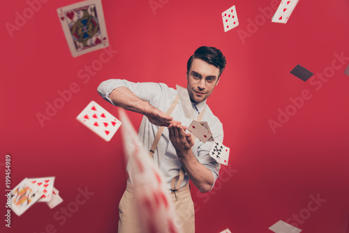 Cuadros en Lienzo Professional, cunning joyful magician, illusionist, gambler with tricky glance i