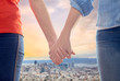 gay, same-sex marriage and homosexual relationships concept - close up of happy lesbian couple holding hands over san francisco city view background