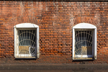 two Windows in the old brick building