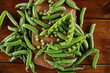 © dyageleva - Fresh Green peas. Top view. Pea on wooden background