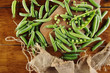 © dyageleva - Fresh Green peas. Top view. Pea on wooden background