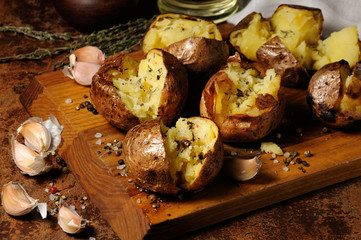 baked potato with spices and herbs