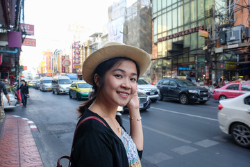 young asian women backpack traveller stand in yaowarad city of chinese