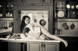 © T.Den_Team - Attractive sexy european woman on a modern kitchen wear lingerie and feeling good, vintage style and modern element in interior