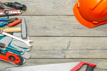 Wall Mural - Assorted work tools on wooden table