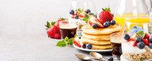 Breakfast Composition With Fresh Pancakes And Berries On Light Gray Concrete Background. Healthy Food Concept With Copy Space. Banner.
