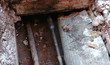 Crash, burst pipes and leaking water under the earth. Excavated pipes in the winter.