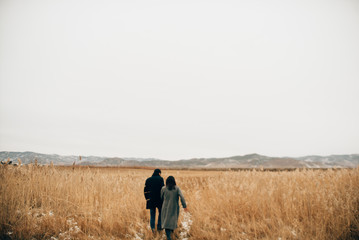 Wall Mural -  Happy lovers have a time outdoors