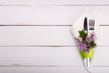 Spring Festive Table Setting With Vintage Cutlery And Lilac Flowers On White Wooden Table,copy Space Flat Lay