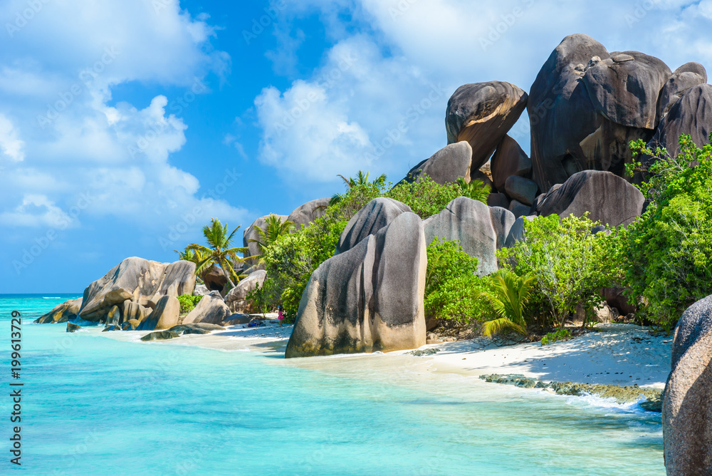 Source d'Argent Beach at island La Digue, Seychelles - Beautifully shaped granite boulders and rock formation - Paradise beach and tropical destination for vacation - obrazy, fototapety, plakaty 