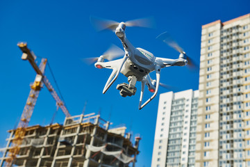 Wall Mural - drone survellance over construction area. building site inspection.