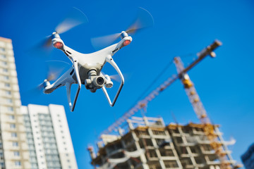 Wall Mural - drone survellance over construction area. building site inspection.
