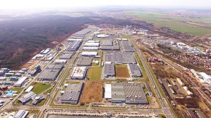 Wall Mural - Aerial view from drone to industrial zone and technology park on Borska pole of Pilsen city in Czech Republic, Europe. European industry from above. 